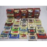 A collection of boxed die-cast vehicles including Matchbox Models of Yesteryear, Lledo Days Gone,