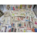 A collection of vintage sewing patterns including Vogue