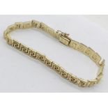 A 9ct gold Greek key pattern bracelet, weight 10.7g