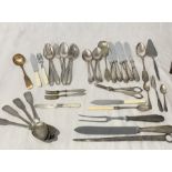 A collection of cutlery mainly silver plated and some silver