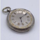 A fine silver fob watch with silvered dial