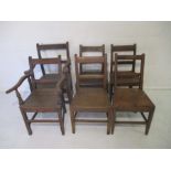 A harlequin set of six country dining chairs, including two carvers.