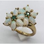 A 9ct gold opal and tourmaline cluster ring