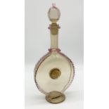 A Venetian glass decanter