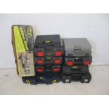 A collection of various cased/boxed power tools and accessories including a Titan power drill,