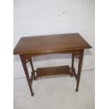 An oak occasional table.