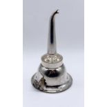A silver plated wine funnel