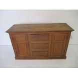 An antique oak dresser base (no handles), length 140cm, height 85cm.