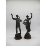 A pair of French spelter figures, by Guillemin.