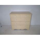 A Victorian painted pine chest of drawers, with original handles, length 107cm, height 97cm.