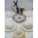 A small collection of china including a Staffordshire pottery rabbit, Wind in the Willow plates