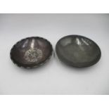 Two Hugh Wallis Arts and Crafts metal bowls, with marks to base.