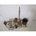 A quantity of brass and copper items, including coal scuttle, bed pan, candle sticks etc.