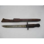 A World War 1 bayonet with leather sheaf. Bayonet bears the markings Ross Rifle Co.Quebec and on the