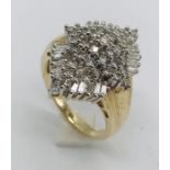 A 14ct gold dress ring set with diamonds, total weight 6g