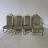 A set of eight upholstered dining chairs, including two carvers as found.