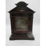 An Edwardian bracket clock.