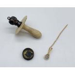 A hallmarked silver and bone babies dummy, a small compass (possibly escape and evasion WWII