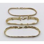 Three 9ct gold bracelets, total weight 26.3g