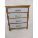 A part painted chest of four drawers.