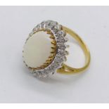 A 9ct gold opal and diamond cluster ring