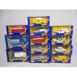 A collection of boxed Corgi die-cast vehicles including RAC Service Ford Transit, Police Rover