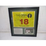 A framed golf 18th hole pin flag from The Open Championship Carnoustie 2007, signed by the