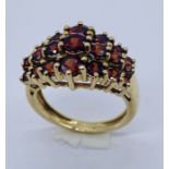 A 9ct gold garnet dress ring, total weight 4.2g