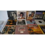 A large quantity of 12" vinyl records, including Roberta Flack, David Bowie, Pink Floyd, Don McLean,