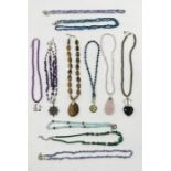A collection of 925 silver mounted necklaces including malachite, tigers eye, etc