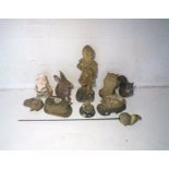 A quantity of garden ornaments, including some reconstituted stone, in the form of rabbits,