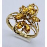 A 9ct gold citrine and diamond dress ring