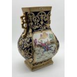 A large Chinese two handled vase with gilt decoration depicting European hunting scenes -