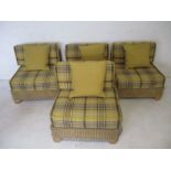 Four large matching modular wicker conservatory chairs with cushions.