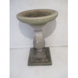 A reconstituted stone bird bath, in three sections.