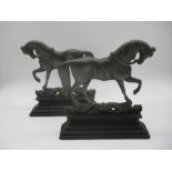A pair of Victorian cast metal doorstops in form of horses, marked to reverse No 3/No 4