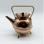 Dr Christopher Dresser for Benham and Froud, a copper and brass kettle with upturned rim, angular