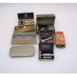 A quantity of vintage boxed shaving kits and razors.