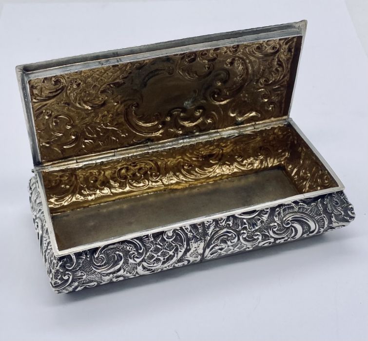 A hallmarked silver repousse box, length approx 11.75cm - Image 2 of 3