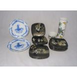 A collection of nine Arabia Finland wall plates, along with two Delphi blue and white plates, a