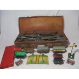 A collection of Hornby Trains clockwork O gauge accessories including two coaches, signal box,