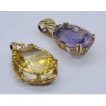 A large amethyst pendant set in 9ct gold along with a similarly set citrine