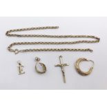 A collection of 9ct gold, chain (A/F), crucifix and two earrings (total weight 7.7g) along with a