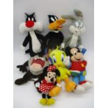 A collection five Looney Tunes soft toys including Daffy Duck, Bugs Bunny, Sylvester, Tweety and