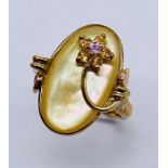 A 9ct gold dress ring set with a ruby and citrines