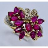 A 9ct gold ruby and diamond dress ring