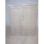A Victorian painted cupboard, length 101cm, height 128cm, depth 64cm.