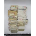 A large collection of first day covers and worldwide vintage correspondence envelopes.