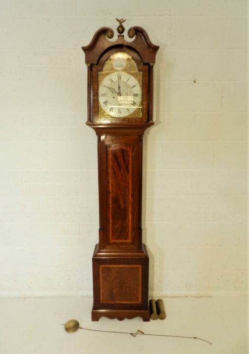 A Georgian inlaid mahogany eight day longcase clock with fusee movement. Silvered dial engraved with