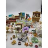 A selection of dolls house furniture and accessories
